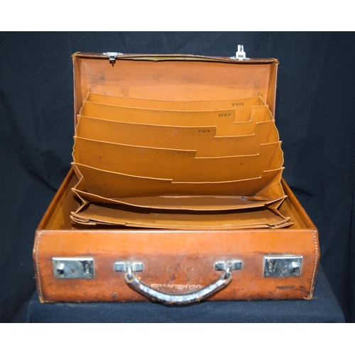 3414 - A vintage leather briefcase with alphabetical dividers