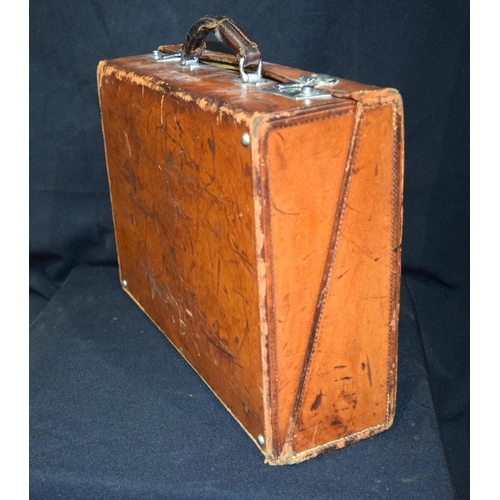 3414 - A vintage leather briefcase with alphabetical dividers