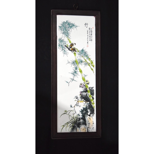 3426 - A Framed Chinese porcelain plaque Birds and foliage 49 x 17cm