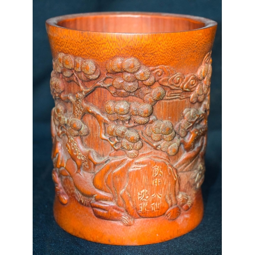 3441 - A  Chinese bamboo brush pot carved with figures in a land scape 16cm