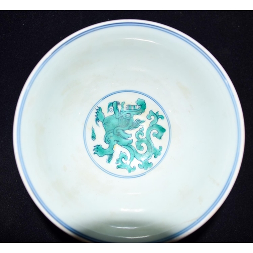 3461 - A  Chinese Stem cup decorated with green dragons 11cm x 16cm