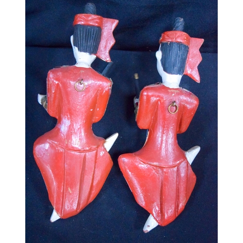 3480 - Two painted wooden Thai figures decorated with coloured glass