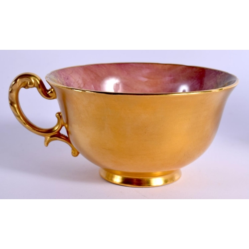 114 - A ROYAL WORCESTER CUP AND SAUCER, the cup painted inside and with gold outside, both with fruit by M... 