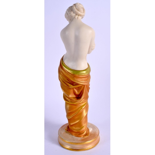 121 - A ROYAL WORCESTER SHOT GOLD FIGURE OF JOY, puce mark date code for 1906. 25.5cm high