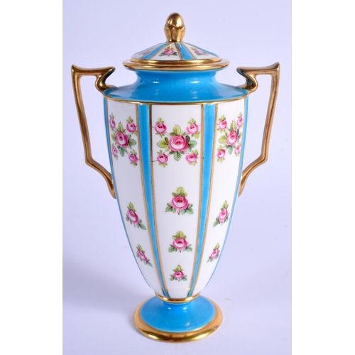 123 - A LATE 19/ EARLY 20TH C. MINTON TWO HANDLED VASE AND COVER delicately painted with small roses in pa... 