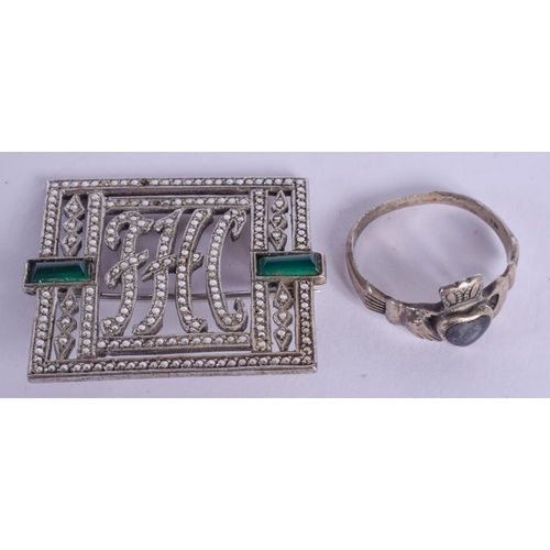 1262 - A SILVER BROOCH AND RING. (2)