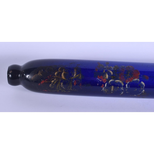 13 - A LONG ANTIQUE BRISTOL BLUE ROLLING PIN painted with flowers. 68 cm long.