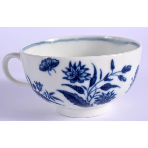 130 - A 18TH C. WORCESTER HANDLED TEABOWL AND SAUCER decorated with blue flowers, script W mark. Saucer ... 