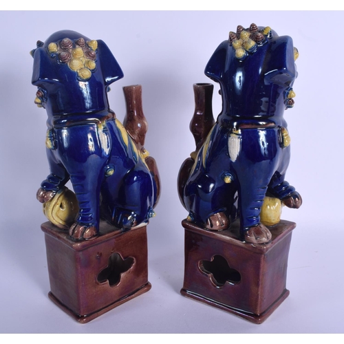 1518 - A PAIR OF 19TH CENTURY CHINESE BLUE GLAZED BUDDHISTIC DOGS OF FOE Qing, modelled upon a brown glazed... 