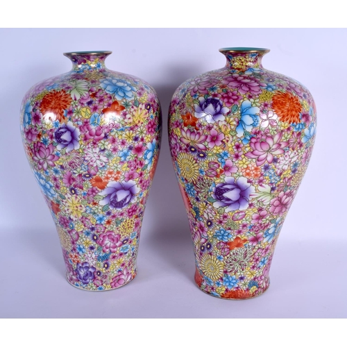 1520 - A PAIR OF CHINESE FAMILLE ROSE BALUSTER PORCELAIN VASES 20th Century, painted with flowers. 38 cm hi... 