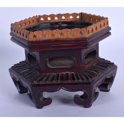 1528 - A LATE 19TH CENTURY CHINESE HARDWOOD AND SANDALWOOD STAND Qing, of hexagonal form. 11 cm x 9 cm.