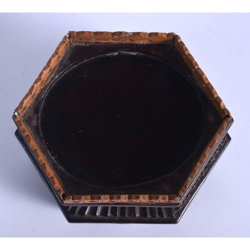 1528 - A LATE 19TH CENTURY CHINESE HARDWOOD AND SANDALWOOD STAND Qing, of hexagonal form. 11 cm x 9 cm.