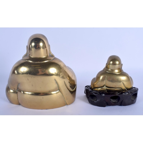 1535 - TWO EARLY 20TH CENTURY CHINESE POLISHED BRONZE BUDDHAS Qing. Largest 17 cm x 11 cm. (3)