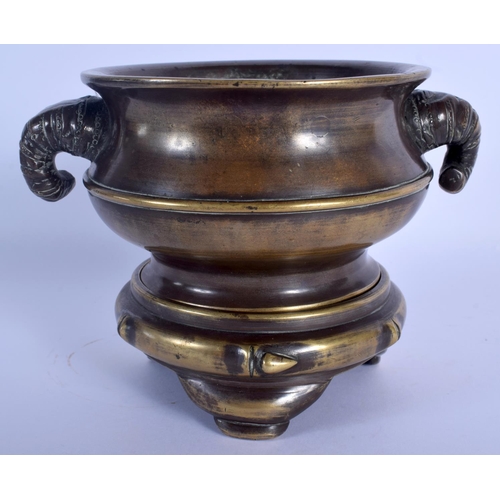 1539 - A RARE 19TH CENTURY CHINESE BRONZE CENSER ON STAND Qing, formed with bamboo type handles, of natural... 