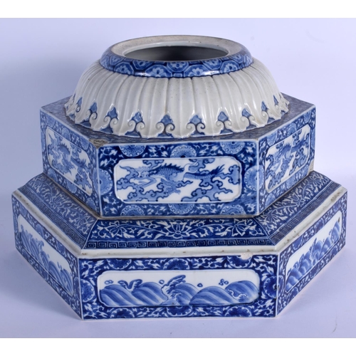 1566 - AN UNUSUAL 19TH CENTURY JAPANESE MEIJI PERIOD BLUE AND WHITE STAND painted with dragons and floral s... 