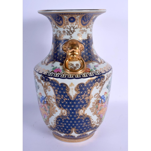 1567 - A CHINESE TWIN HANDLED PORCELAIN VASE 20th Century, decorated with European subjects. 36 cm x 19 cm.