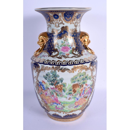 1567 - A CHINESE TWIN HANDLED PORCELAIN VASE 20th Century, decorated with European subjects. 36 cm x 19 cm.