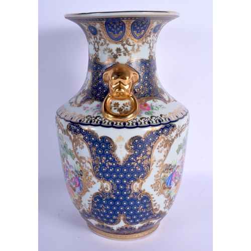 1567 - A CHINESE TWIN HANDLED PORCELAIN VASE 20th Century, decorated with European subjects. 36 cm x 19 cm.