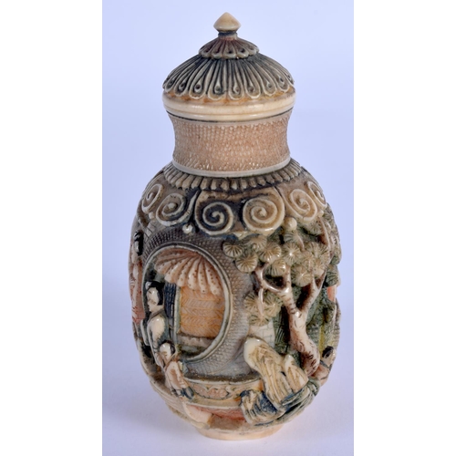 1570 - A GOOD 19TH CENTURY CHINESE CARVED POLYCHROMED IVORY SNUFF BOTTLE Qing, decorated with figures withi... 