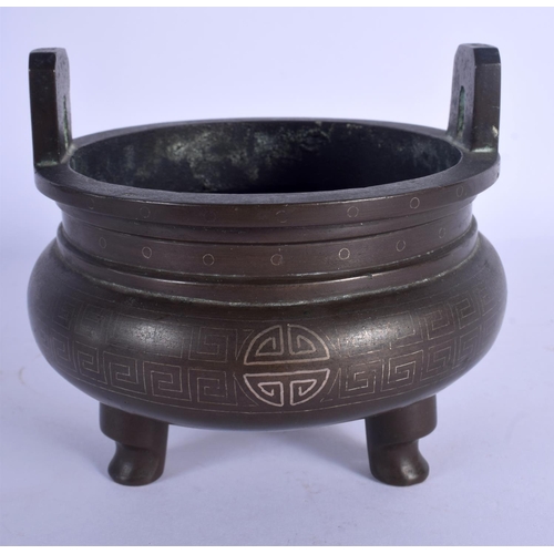 1597 - A 19TH CENTURY CHINESE TWIN HANDLED BRONZE CENSER Qing, silver inlaid with shou characters. 887 gram... 