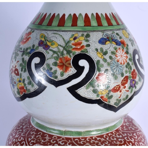 1602 - A LARGE LATE 19TH CENTURY JAPANESE MEIJI PERIOD TRIPLE GOURD VASE enamelled with floral sprays and t... 