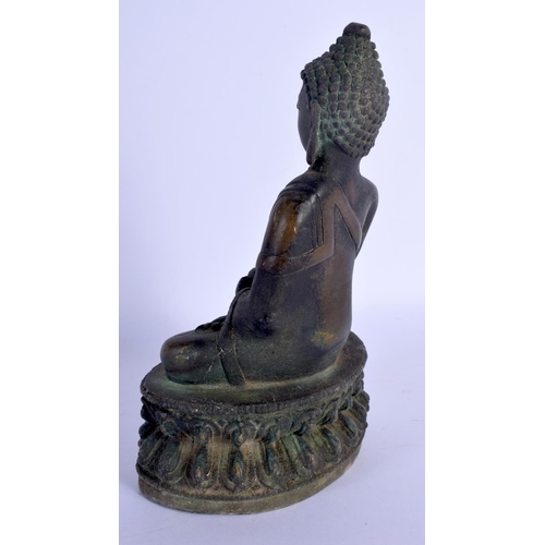 1604 - A CHINESE TIBETAN BRONZE BUDDHA 20th Century. 15 cm high.