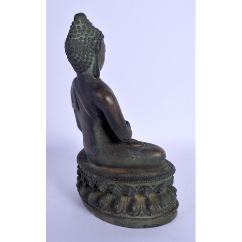 1604 - A CHINESE TIBETAN BRONZE BUDDHA 20th Century. 15 cm high.