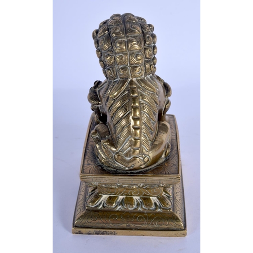 1606 - AN 18TH CENTURY CHINESE BRONZE FIGURE OF A BUDDHISTIC LION Qing. 11 cm x 7 cm.