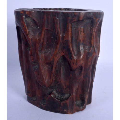 1607 - A GOOD 18TH CENTURY CHINESE CARVED HARDWOOD BRUSH POT Qing, of naturalistic form. 14 cm x 12 cm.