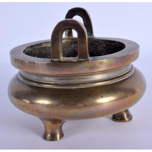 1608 - AN 18TH CENTURY CHINESE TWIN HANDLED BRONZE CENSER Qing, of plain form. 837 grams. 10.5 cm wide, int... 