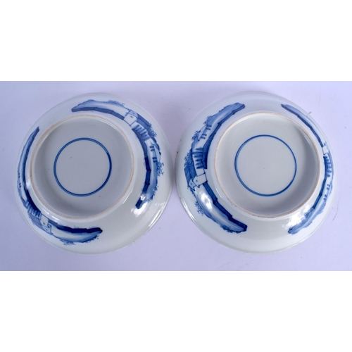 1612 - A PAIR OF 19TH CENTURY CHINESE BLUE AND WHITE PORCELAIN DISHES Kangxi style, painted with scholars w... 