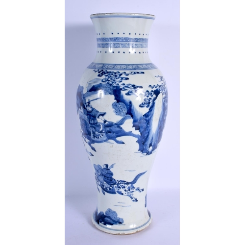 1614 - A LARGE 19TH CENTURY CHINESE BLUE AND WHITE BALUSTER VASE Kangxi style, painted with warriors within... 