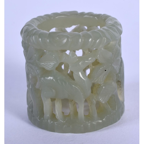 1617 - AN EARLY 20TH CENTURY CHINESE GREEN JADE ARCHERS RING Late Qing/Republic, decorated with deer. 2.5 c... 