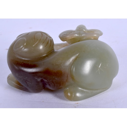 1631 - AN EARLY 20TH CENTURY CHINESE CARVED GREEN JADE FIGURE OF A CAT Late Qing. 5 cm x 2.5 cm.