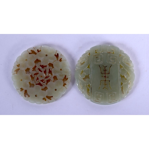 1635 - TWO EARLY 20TH CENTURY CHINESE CARVED JADE PLAQUES Late Qing. 5 cm diameter. (2)