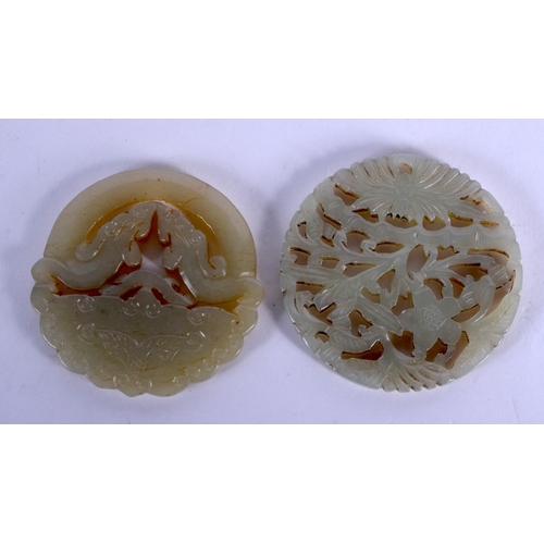 1637 - TWO EARLY 20TH CENTURY CHINESE CARVED JADE PLAQUES Late Qing. 5 cm diameter. (2)