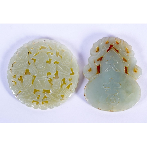 1644 - TWO EARLY 20TH CENTURY CHINESE CARVED JADE PLAQUES Late Qing. 5 cm diameter. (2)