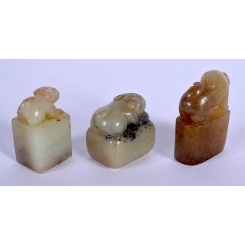 1647 - THREE EARLY 20TH CENTURY CHINESE CARVED GREEN JADE SEALS Late Qing. Largest 4.5 cm x 3 cm. (3)