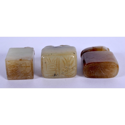 1647 - THREE EARLY 20TH CENTURY CHINESE CARVED GREEN JADE SEALS Late Qing. Largest 4.5 cm x 3 cm. (3)