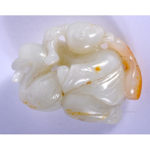 1652 - A CHINESE CARVED RUSSET WHITE JADE FIGURE OF A BOY 20th Century, modelled holding a duck. 6.5 cm x 4... 