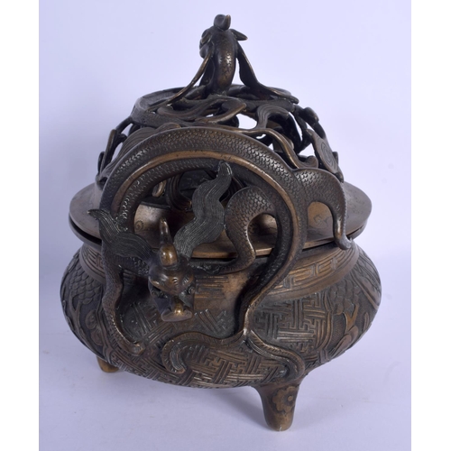 1653 - A LARGE 19TH CENTURY CHINESE TWIN HANDLED BRONZE CENSER AND COVER Qing, decorated with figures and l... 