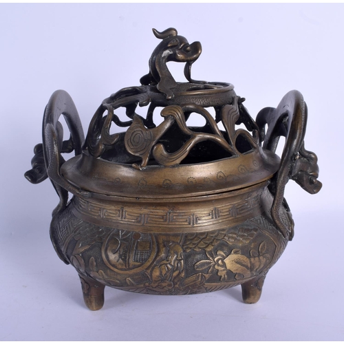 1653 - A LARGE 19TH CENTURY CHINESE TWIN HANDLED BRONZE CENSER AND COVER Qing, decorated with figures and l... 