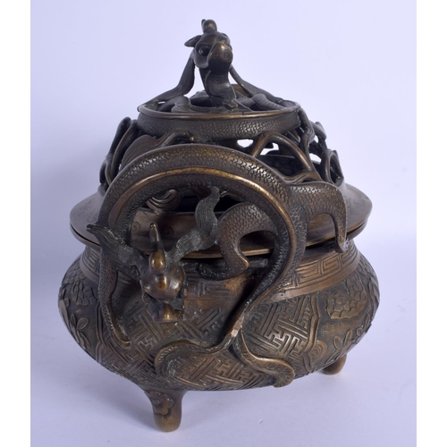 1653 - A LARGE 19TH CENTURY CHINESE TWIN HANDLED BRONZE CENSER AND COVER Qing, decorated with figures and l... 