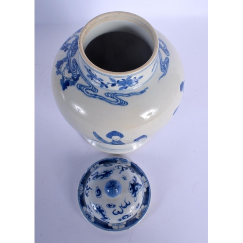 1656 - A 19TH CENTURY CHINESE BLUE AND WHITE PORCELAIN JAR AND COVER Kangxi style, painted with females wit... 