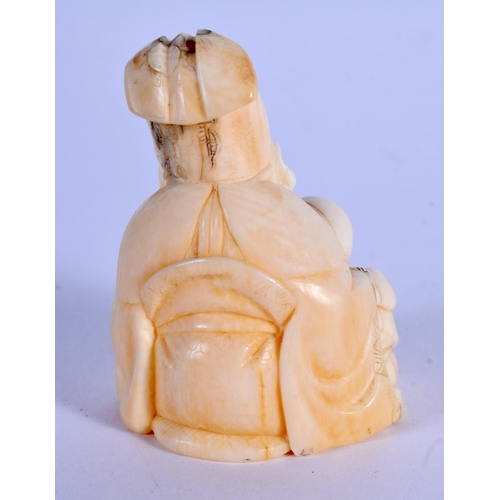 1675 - A 19TH CENTURY JAPANESE MEIJI PERIOD CARVED IVORY NETSUKE formed as a seated scholar. 4.25 cm x 3 cm... 