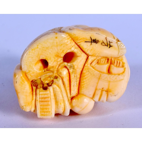 1675 - A 19TH CENTURY JAPANESE MEIJI PERIOD CARVED IVORY NETSUKE formed as a seated scholar. 4.25 cm x 3 cm... 