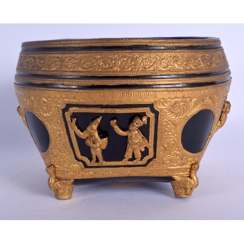 1681 - AN EARLY 20TH CENTURY THAI ASIAN GILT LACQUERED ALMS BOWL decorated with figures. 11 cm x 4 cm.