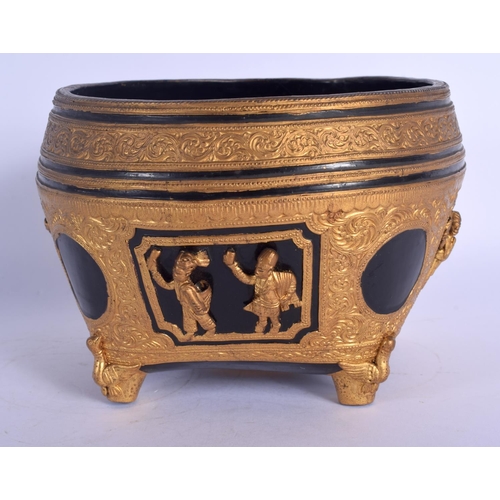 1681 - AN EARLY 20TH CENTURY THAI ASIAN GILT LACQUERED ALMS BOWL decorated with figures. 11 cm x 4 cm.