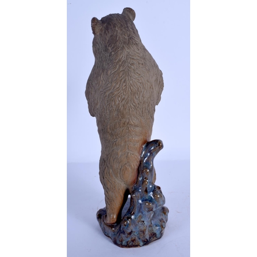 1691 - AN UNUSUAL CHINESE STONEWARE FIGURE OF A BEAR 20th Century. 24 cm high.