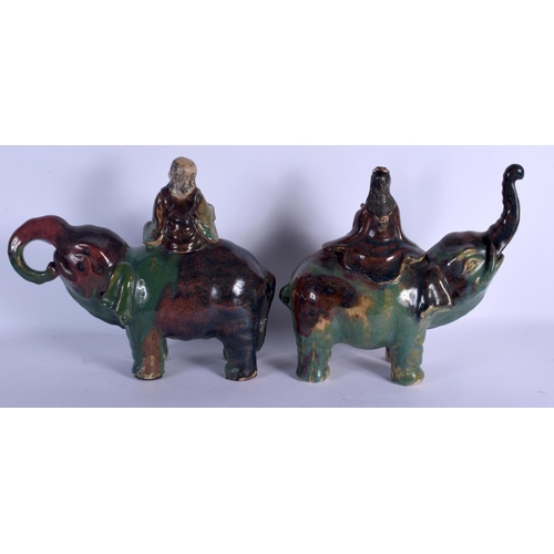 1711 - A LARGE AND UNUSUAL PAIR OF LATE 19TH CENTURY JAPANESE MEIJI PERIOD ELEPHANTS modelled with attendan... 